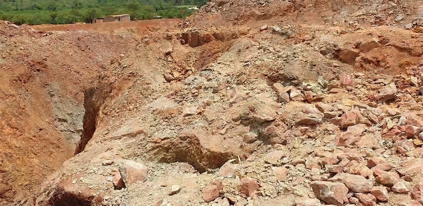 Miners working an open pit at a Papon Ltd mining interest